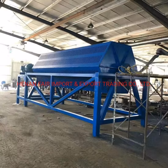 バックルやボタンなどを研磨する遠心ドラム研磨機。